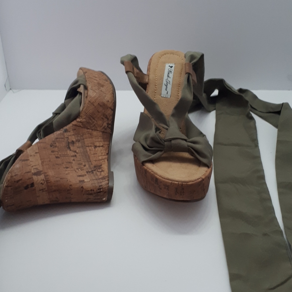 Up the leg wedge shoes
